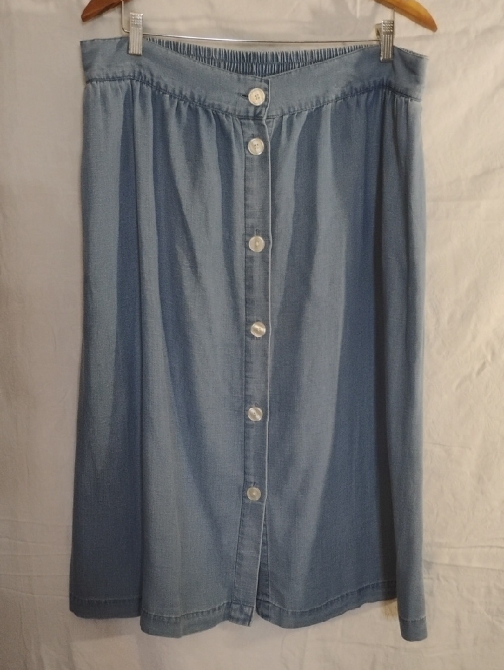 LOFT Soft Light Blue Denim Button-Front Midi Skirt With Pockets.